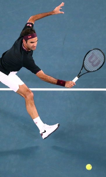 Federer tops Australia's Millman in 5 sets at Melbourne Park